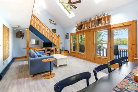 Curl up in the open living room & enjoy a movie with gorgeous water views