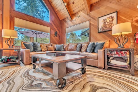 Living room 1: Smart TV, baseboard heating and no  A/C, gas fireplace. access to upper deck, main floor