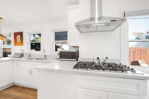 Dine in style with a kitchen that boasts modern appliances and beautiful finishes.