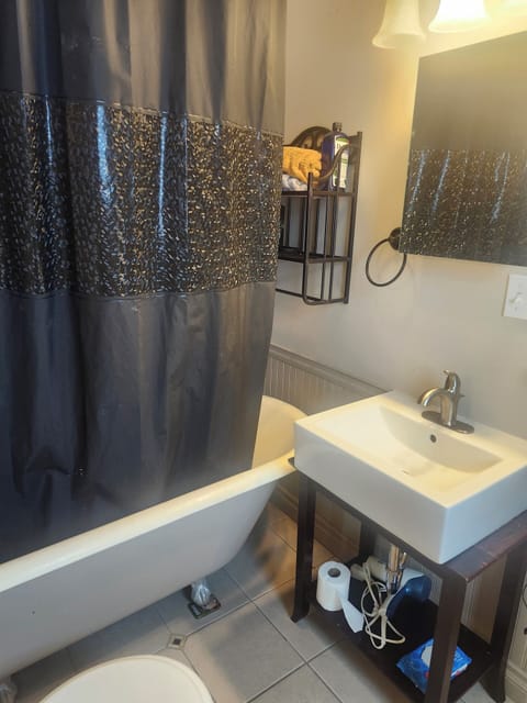 Bathroom with original clawfoot tub