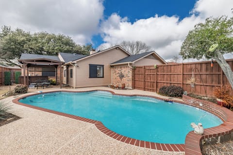Family friendly swimming pool in private backyard