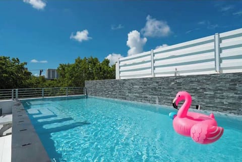 Wake up to breathtaking water views from the comfort of your bed. This beautifully appointed master suite is a peaceful sanctuary with a private balcony, offering a serene escape for a truly relaxing stay.
