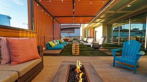 Gather by the glowing fire pit for sunset conversations.