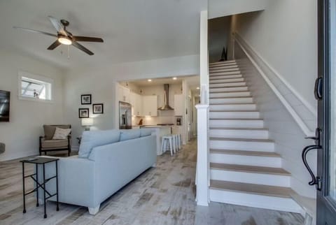 Stairs with Safety Railing Leading to Upstairs Living Room