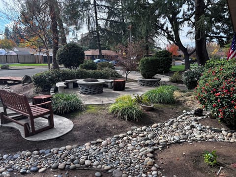 tranquil fire pit surrounded by rock river