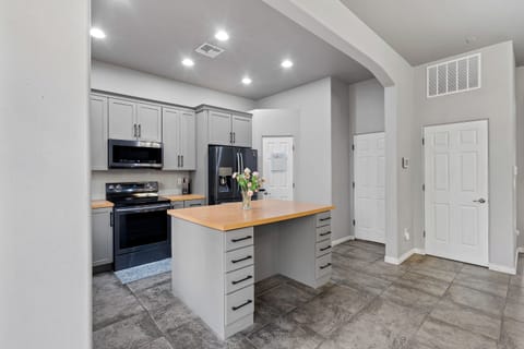 Kitchen is stocked with cooking essentials.
