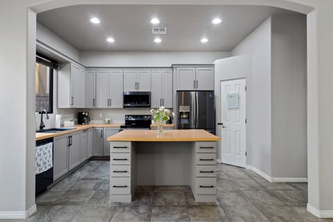 Kitchen is stocked with cooking essentials.