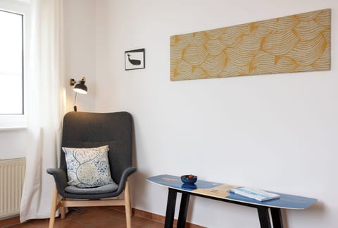 Apartment Wellengang Wittdün/Amrum   Reading chair with side table