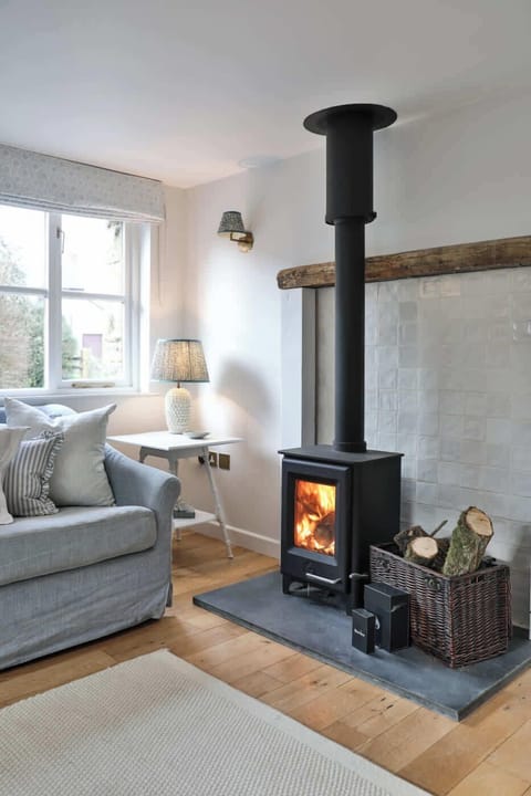 Large lounge with log burner, smart TV and comfortable sofa