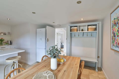 Comfortable dining space where everyone can gather for meals, games, or planning your day out.