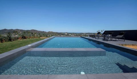 Opulent Outdoor Swimming Haven with Mountain and Sea Views