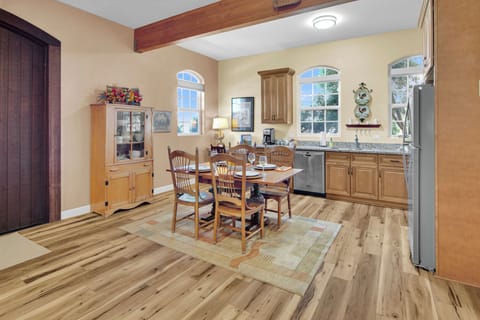 An overview of the kitchen and dining area. (2)