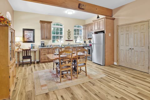 An overview of the kitchen and dining area. (3)