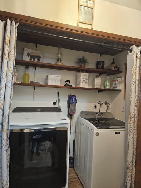 Full size washer and dryer, iron/ironing board, first aid kit