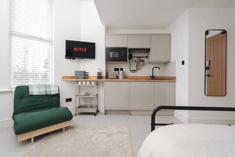 Enjoy the convenience of your own private kitchenette, with access to a fully equipped shared kitchen just steps away for larger meals or extra cooking space.
Includes Private Washing Machine