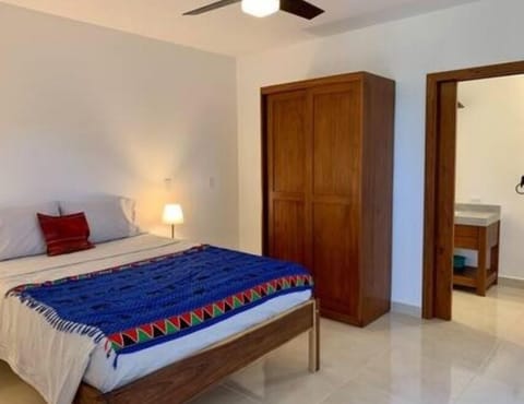 the two bedrooms are the same with queen beds, private bath, ceiling fan and AC
