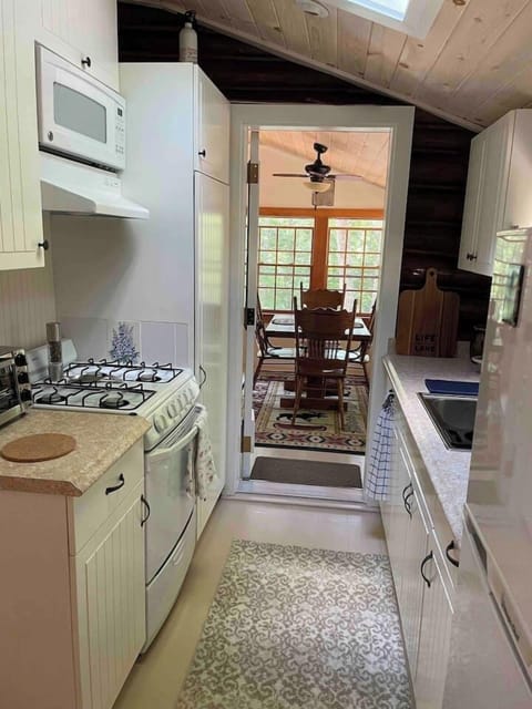 Fully equipped kitchen for cooking and serving in the dining area. 