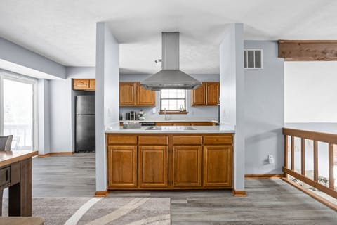 A view into our kitchen, with modern appliances and ample space for cooking!