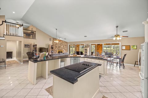 While you're cooking the open floor plan helps you stay connected.