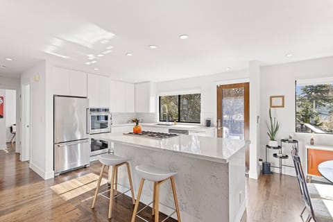 Gourmet kitchen with 5 burner gas Bertazoni stove top, Kitchen Aid appliances, double oven, Berkey water filter system, & Breville Espresso maker