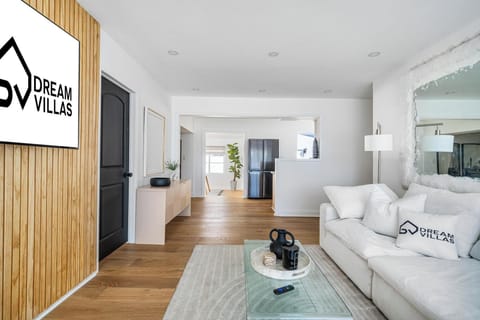Open-concept living space with hardwood floors.