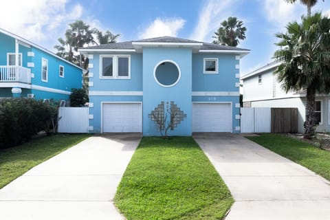 Charming coastal home with plenty of parking and beachy curb appeal