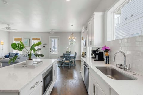 Kitchen: Main floor,drip coffee maker, keurig, crockpot, toaster, cooking utensils, tableware