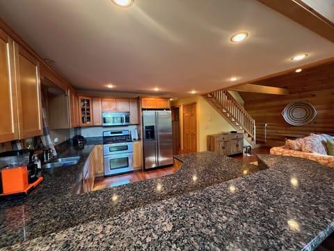 Large, well-appointed kitchen - gas range with double oven and dishwasher