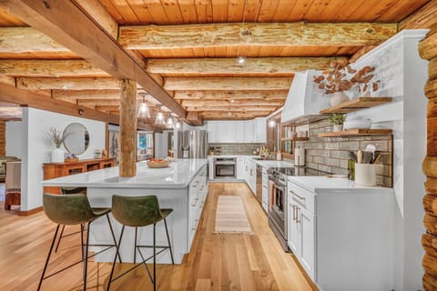 This bright, open kitchen with its long island flows easily for cooking, gathering, and sharing time together.
