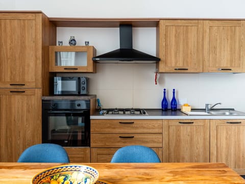 Wood, Kitchen, Cabinetry, Furniture, Kitchen Appliance, Major Appliance, Kitchen Stove, Gas Stove, Stove, Countertop