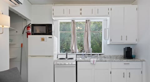 Small but stove-tacular. Cook up charm or just caffeinate near the window with a view!