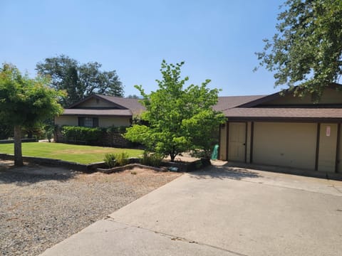 House as seen in front of the barn 