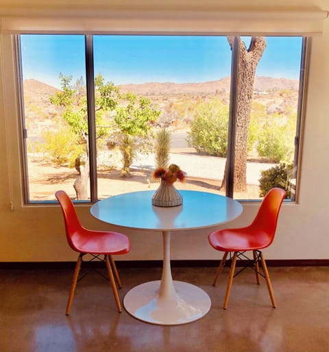 Living room dining table. Perfect for watching the sunrise, with morning coffee.