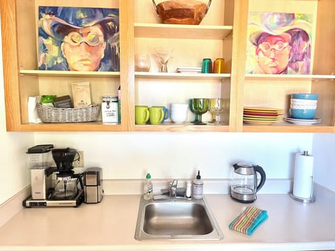 Joshua Tree dark roast coffee & grinder, teas, hot water dispenser. 