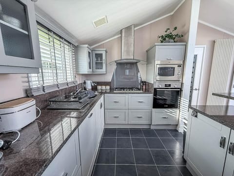 Bright, modern kitchen with sleek granite countertops and stainless appliances