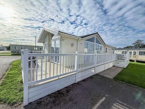 Accessible entrance with spacious outdoor deck for relaxing gatherings