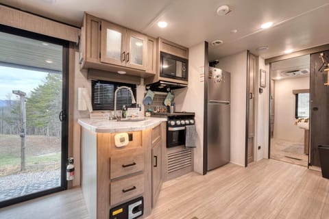 Whip up mountain meals in a bright, modern kitchen with scenic views nearby.