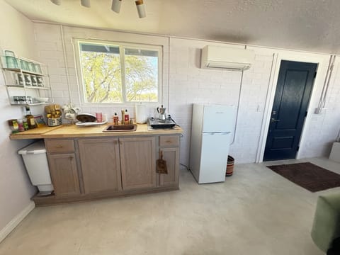 All the necessities for easy meals in our bright kitchenette.