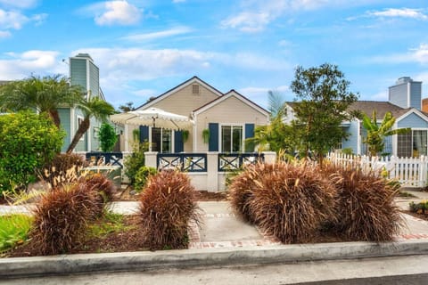 Welcome to your dream beach escape! This beautifully landscaped home offers a perfect blend of comfort and coastal charm.