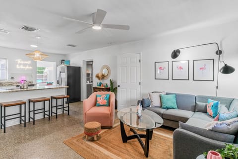 A bright and stylish living room with comfortable seating.