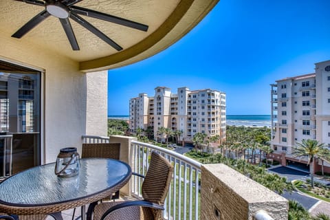 Primary balcony space overlooking the community and the beach.