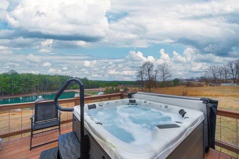 Welcome to your peaceful retreat—soak in the hot tub and take in the beautiful pond view!