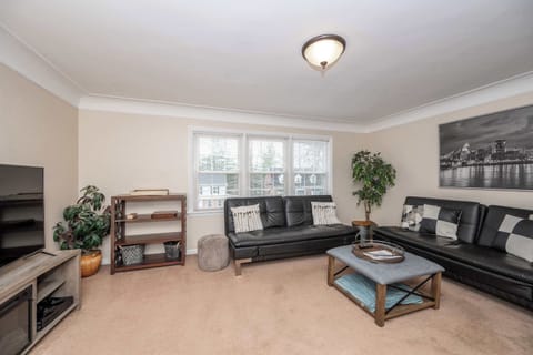 Stream your favorites on the smart TV in the sophisticated living room