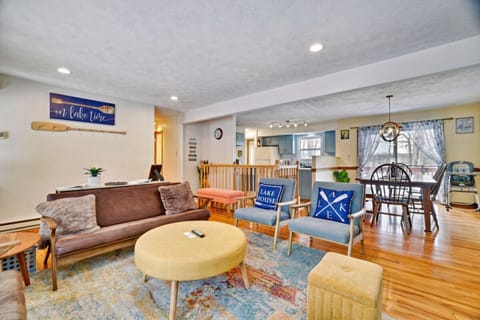 ★☆LAKEFRONT HOME☆★Living Room- Experience open-concept living, perfect for always being in the center of the action. With cozy seating and ample natural light, it's an ideal spot for family gatherings and making lasting memories!