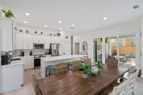 Beautiful wooden table with plenty of seating.