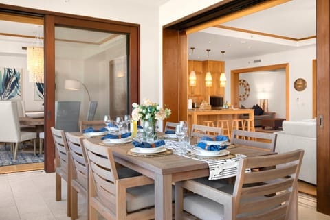 Island charm meets upscale comfort in this open-air dining haven, framed by swaying palms and sparkling sea views