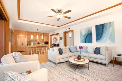 Lounge in style where wave-kissed art meets timeless textures—and the ocean view is your daily masterpiece