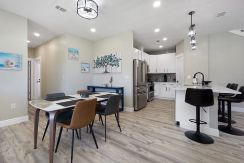 Seating at the island and dining table