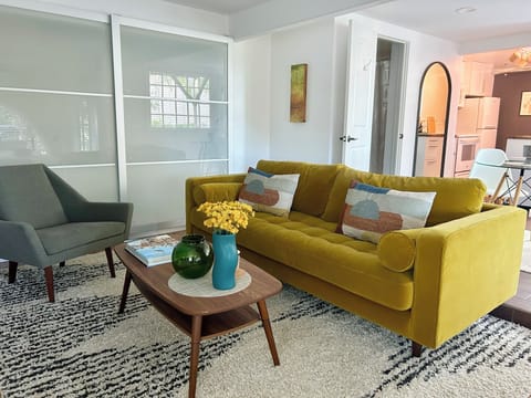 Cozy 84" couch with large screen TV (not pictured here)