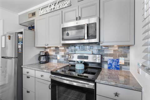 Kitchen Paradise: Modern appliances and stylish decor await your culinary adventures!